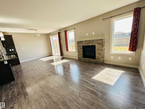 1655 Hammond Crescent, Edmonton, AB - Indoor Photo Showing Living Room With Fireplace