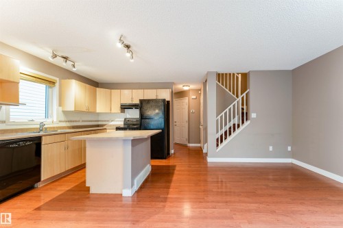 72 2021 Grantham Court, Edmonton, AB - Indoor Photo Showing Kitchen With Double Sink