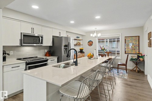 24 165 Cy Becker Blvd, Edmonton, AB - Indoor Photo Showing Kitchen With Double Sink With Upgraded Kitchen