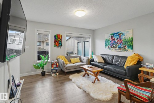 24 165 Cy Becker Blvd, Edmonton, AB - Indoor Photo Showing Living Room