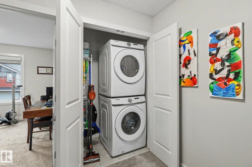24 165 Cy Becker Blvd, Edmonton, AB - Indoor Photo Showing Laundry Room