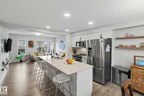 24 165 Cy Becker Blvd, Edmonton, AB - Indoor Photo Showing Kitchen With Stainless Steel Kitchen With Double Sink