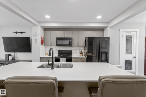 1096 Cy Becker Road, Edmonton, AB - Indoor Photo Showing Kitchen With Double Sink