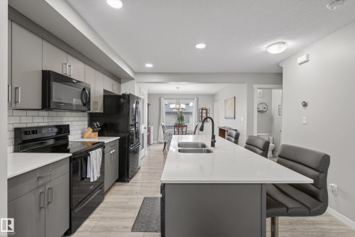 1096 Cy Becker Road, Edmonton, AB - Indoor Photo Showing Kitchen With Double Sink With Upgraded Kitchen