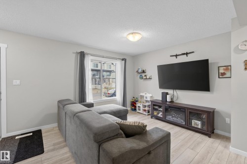 1096 Cy Becker Road, Edmonton, AB - Indoor Photo Showing Living Room