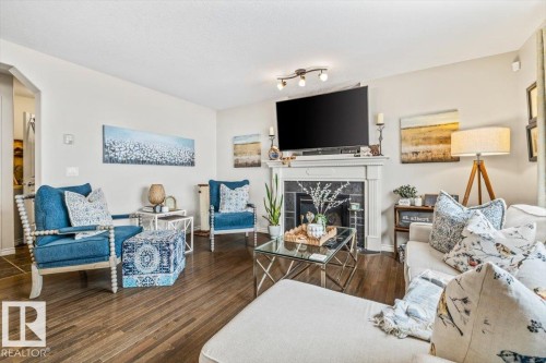 50 Napoleon Crescent, St. Albert, AB - Indoor Photo Showing Living Room With Fireplace