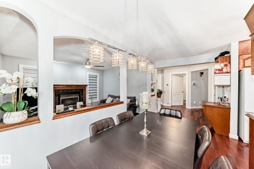 6223 162B Ave, Edmonton, AB - Indoor Photo Showing Dining Room With Fireplace