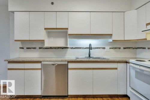 305 4906 47 Avenue, Leduc, AB - Indoor Photo Showing Kitchen With Double Sink