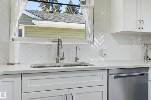 7719 71 Avenue, Edmonton, AB - Indoor Photo Showing Kitchen With Double Sink With Upgraded Kitchen
