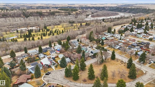 Aerial perspective showcasing a residential area with varied housing styles - 23 Clearwater, Devon, AB - Outdoor With View