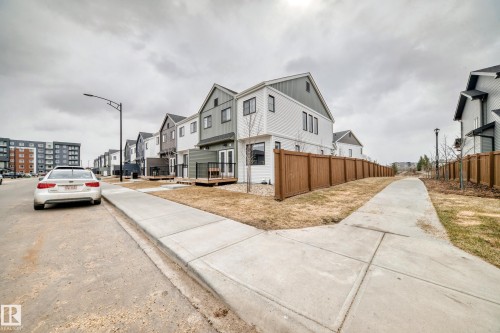Modern townhome exterior with mixed material siding - 38 1910 Collip View, Edmonton, AB - Outdoor