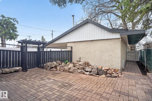 Expansive paver patio with an integrated rock garden - 13332 106 Street, Edmonton, AB - Outdoor