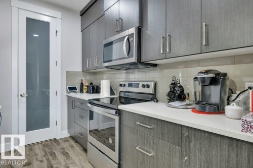 100 Aston Bend, Leduc, AB - Indoor Photo Showing Kitchen With Upgraded Kitchen