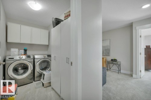 100 Aston Bend, Leduc, AB - Indoor Photo Showing Laundry Room
