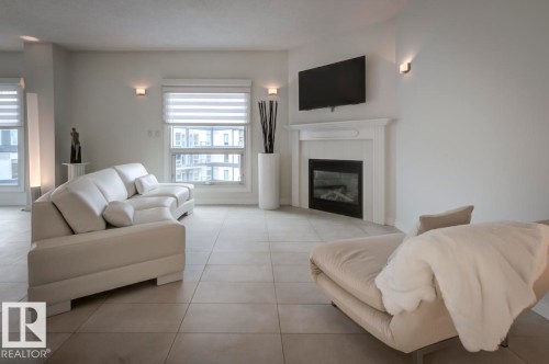 606 10108 125 Street, Edmonton, AB - Indoor Photo Showing Living Room With Fireplace
