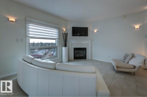 606 10108 125 Street, Edmonton, AB - Indoor Photo Showing Living Room With Fireplace
