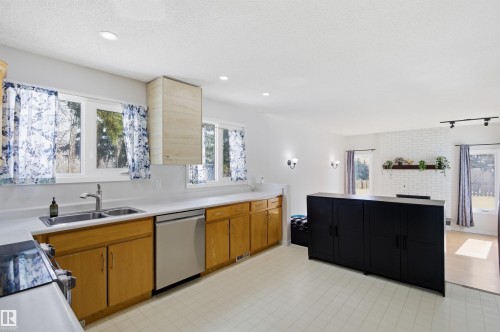 4203 52 Avenue, Beaumont, AB - Indoor Photo Showing Kitchen With Double Sink