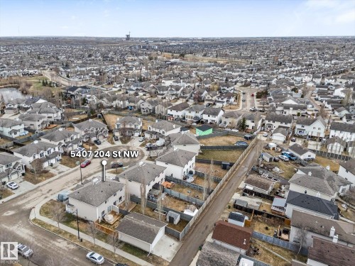 Aerial view showcasing a residential neighborhood with numerous detached homes - 5407 204 Street, Edmonton, AB - Outdoor With View
