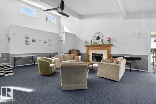 257 Knottwood Road N, Edmonton, AB - Indoor With Fireplace