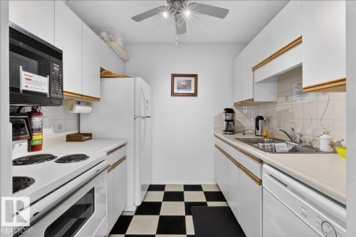 257 Knottwood Road N, Edmonton, AB - Indoor Photo Showing Kitchen With Double Sink