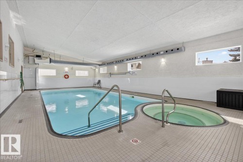 257 Knottwood Road N, Edmonton, AB - Indoor Photo Showing Other Room With In Ground Pool