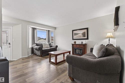 2547 Lockhart Way, Cold Lake, AB - Indoor Photo Showing Living Room With Fireplace