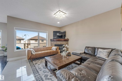 5156 2 Avenue, Edmonton, AB - Indoor Photo Showing Living Room With Fireplace
