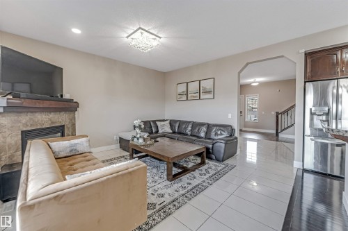 5156 2 Avenue, Edmonton, AB - Indoor Photo Showing Living Room With Fireplace