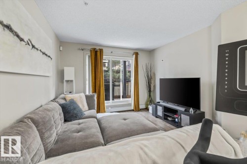 113 5510 Schonsee Drive, Edmonton, AB - Indoor Photo Showing Living Room