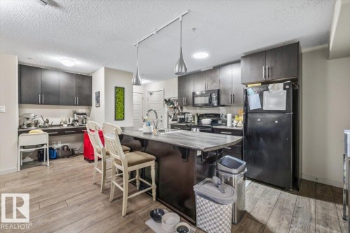 113 5510 Schonsee Drive, Edmonton, AB - Indoor Photo Showing Kitchen