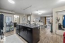 113 5510 Schonsee Drive, Edmonton, AB  - Indoor Photo Showing Kitchen With Double Sink 