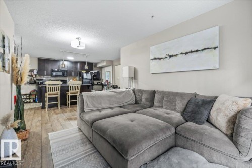 113 5510 Schonsee Drive, Edmonton, AB - Indoor Photo Showing Living Room