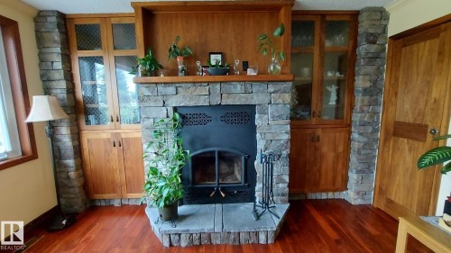 16305 109A Avenue, Edmonton, AB - Indoor Photo Showing Living Room With Fireplace