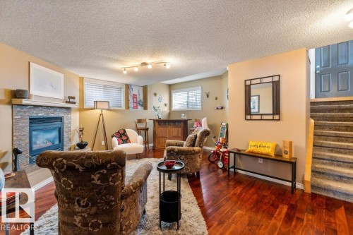 17 Donald Place, St. Albert, AB - Indoor Photo Showing Living Room With Fireplace