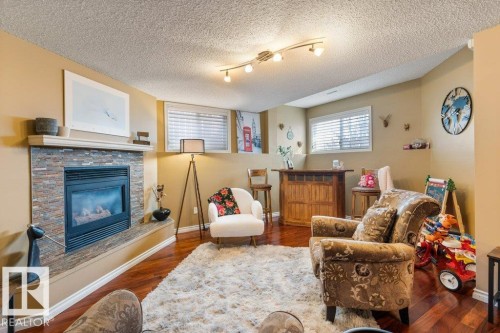 17 Donald Place, St. Albert, AB - Indoor Photo Showing Living Room With Fireplace