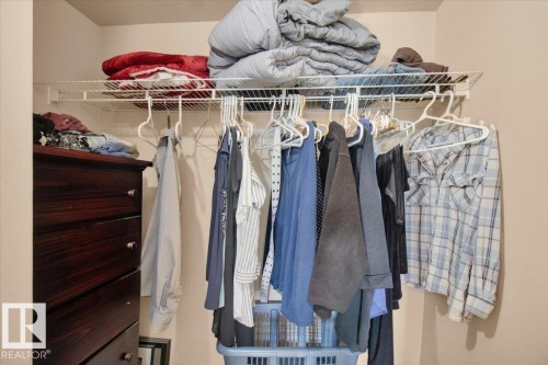 The property features a closet with a wire shelf and hanging rod - 412 2908 116A Avenue, Edmonton, AB - Indoor With Storage
