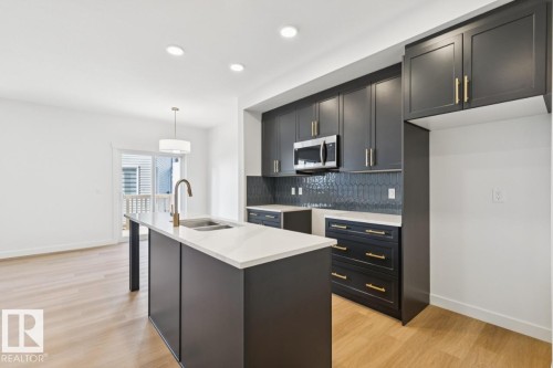 47 710 Mattson Drive Sw, Edmonton, AB - Indoor Photo Showing Kitchen With Double Sink With Upgraded Kitchen