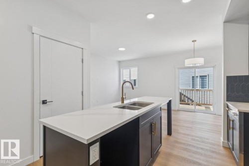 47 710 Mattson Drive Sw, Edmonton, AB - Indoor Photo Showing Kitchen With Double Sink