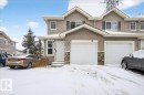 Traditional home with stone siding and an attached garage - 47 230 Edwards Drive, Edmonton, AB  - Outdoor With Facade 
