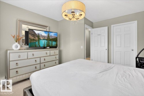 View of carpeted bedroom - 47 230 Edwards Drive, Edmonton, AB - Indoor Photo Showing Bedroom