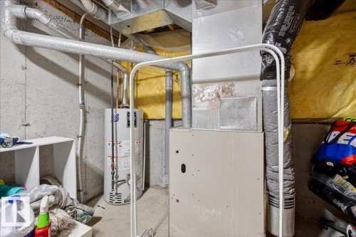Utilities with gas water heater and heating unit - 47 230 Edwards Drive, Edmonton, AB - Indoor Photo Showing Basement