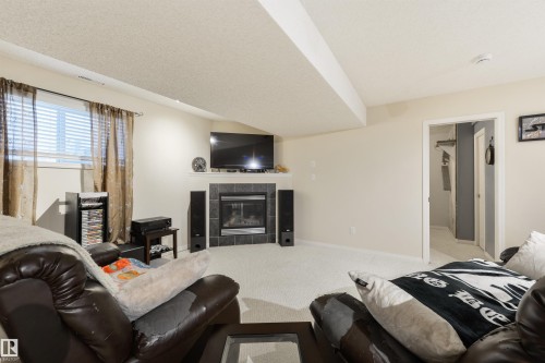 7 Hilldowns Drive, Spruce Grove, AB - Indoor With Fireplace