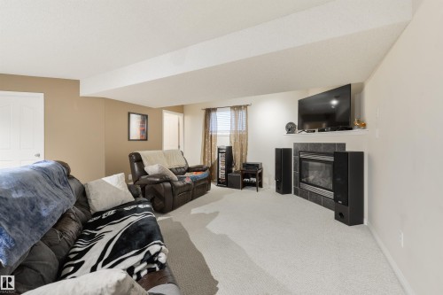 7 Hilldowns Drive, Spruce Grove, AB - Indoor With Fireplace