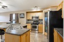 7 Hilldowns Drive, Spruce Grove, AB  - Indoor Photo Showing Kitchen With Double Sink 