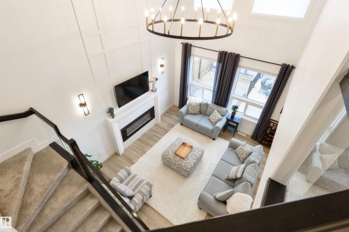 36 Avonlea Way, Spruce Grove, AB - Indoor Photo Showing Other Room With Fireplace