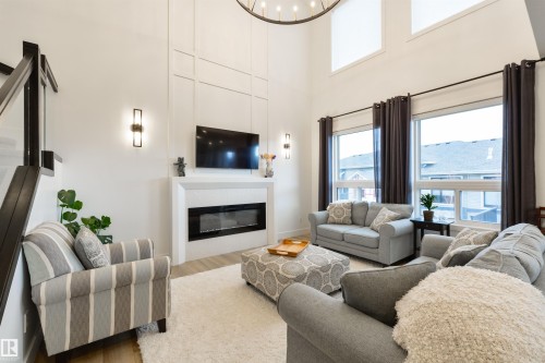 36 Avonlea Way, Spruce Grove, AB - Indoor Photo Showing Living Room With Fireplace
