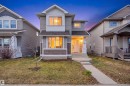 Contemporary two-story residence featuring light gray siding and dark brown accents - 1124 37A Avenue, Edmonton, AB  - Outdoor With Facade 