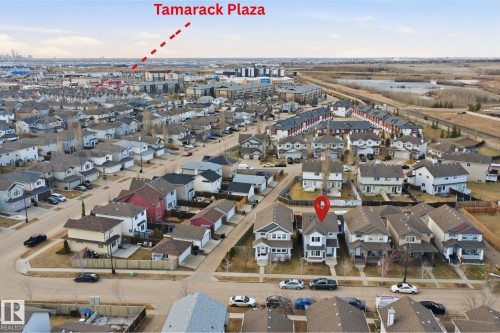 Aerial view showcasing a residential neighborhood with detached homes and townhomes - 1124 37A Avenue, Edmonton, AB - Outdoor With View