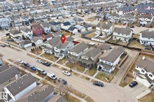 Two-story detached residence with light gray siding and dark gray roofing - 1124 37A Avenue, Edmonton, AB -  With View