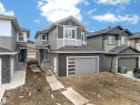 Contemporary facade featuring multiple gables and varied siding textures - 4005 39 Street, Beaumont, AB  - Outdoor With Facade 